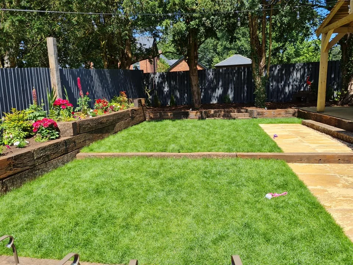Fresh lawn, planting borders and sleeper edged garden